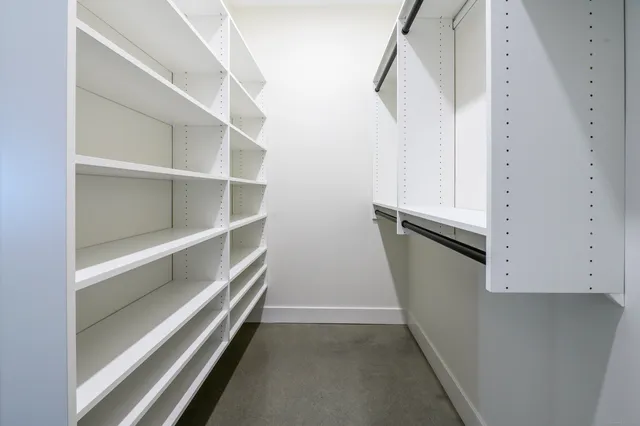 a view of an empty walk in closet