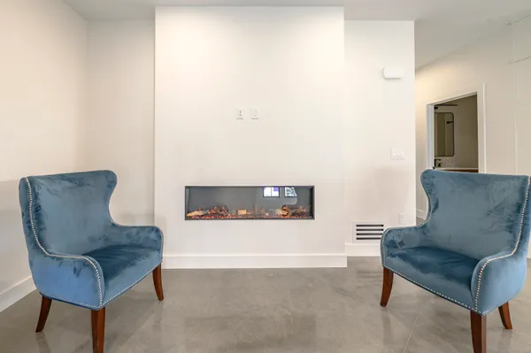 a living room with furniture and a couch