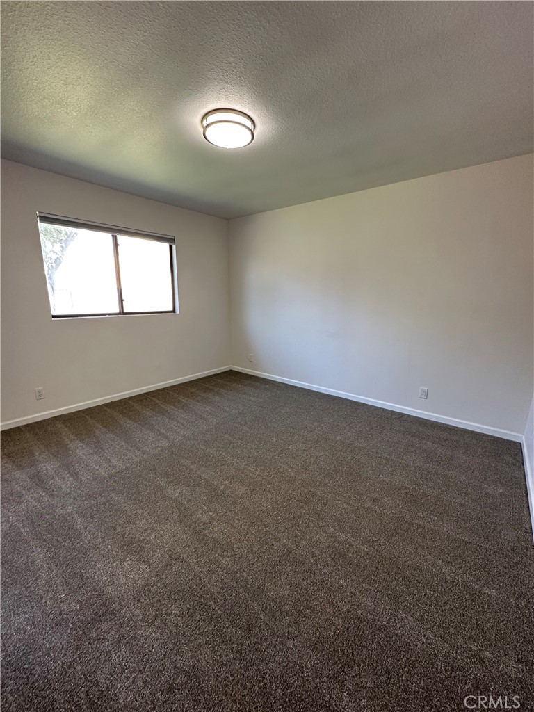 700 West 2nd Street, Unit 3 Azusa, CA 91702 - Photo 11 of 17 an empty room with a window