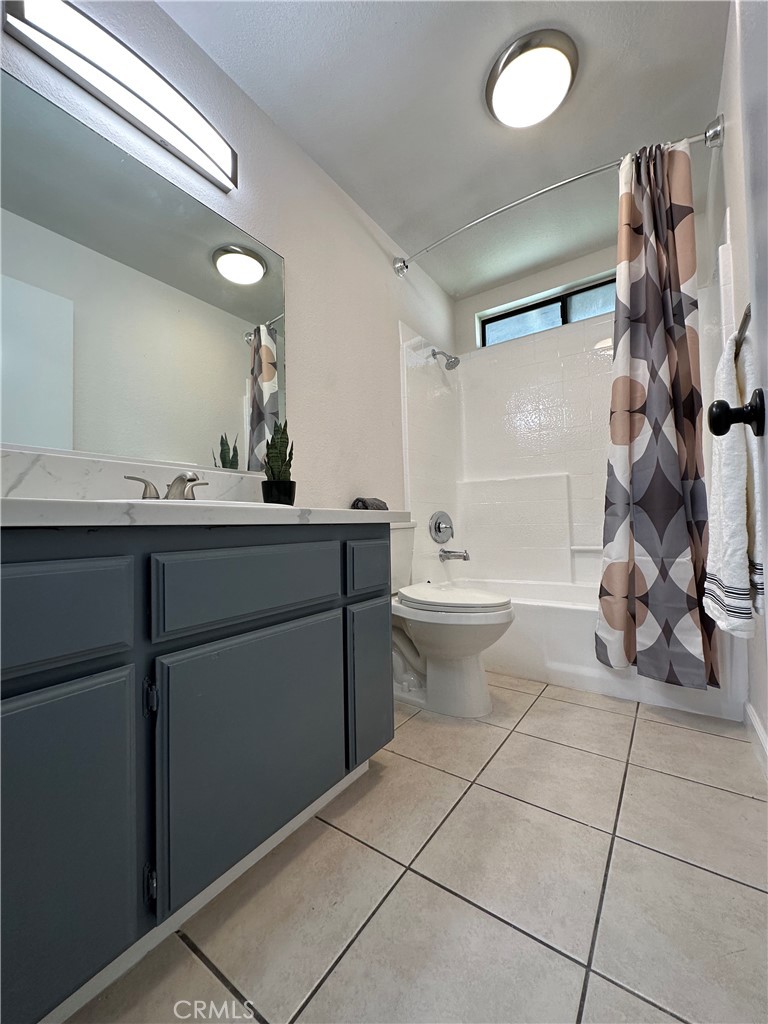 700 West 2nd Street, Unit 3 Azusa, CA 91702 - Photo 12 of 17 a bathroom with a sink toilet and shower
