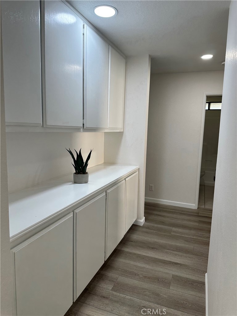 700 West 2nd Street, Unit 3 Azusa, CA 91702 - Photo 7 of 17 a view of cabinets and wooden floor