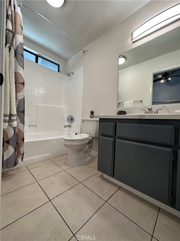 700 West 2nd Street, Unit 3 Azusa, CA 91702 - Photo 9 of 17 a bathroom with a sink toilet and shower