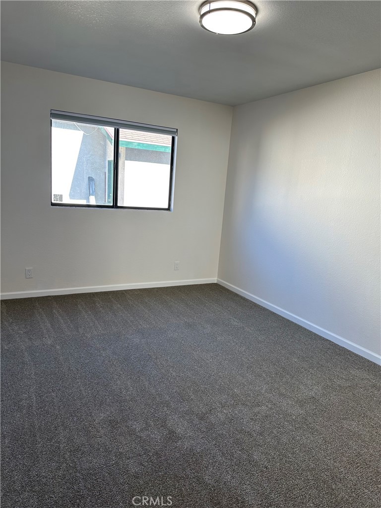 700 West 2nd Street, Unit 3 Azusa, CA 91702 - Photo 10 of 17 an empty room with a window