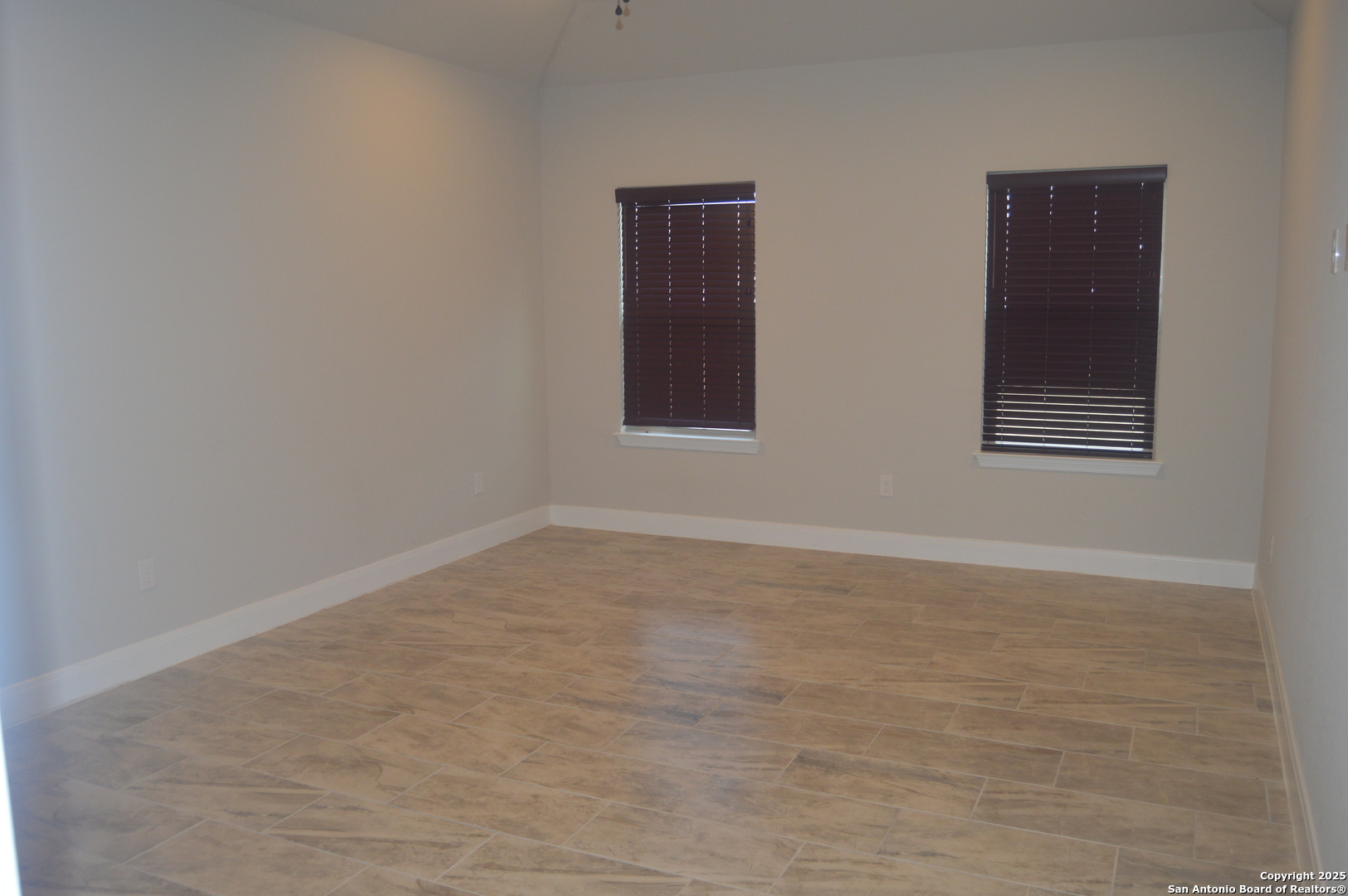 153 West Medium Meadow Drive Lytle, TX 78052 - Photo 15 of 26 an empty room with a window