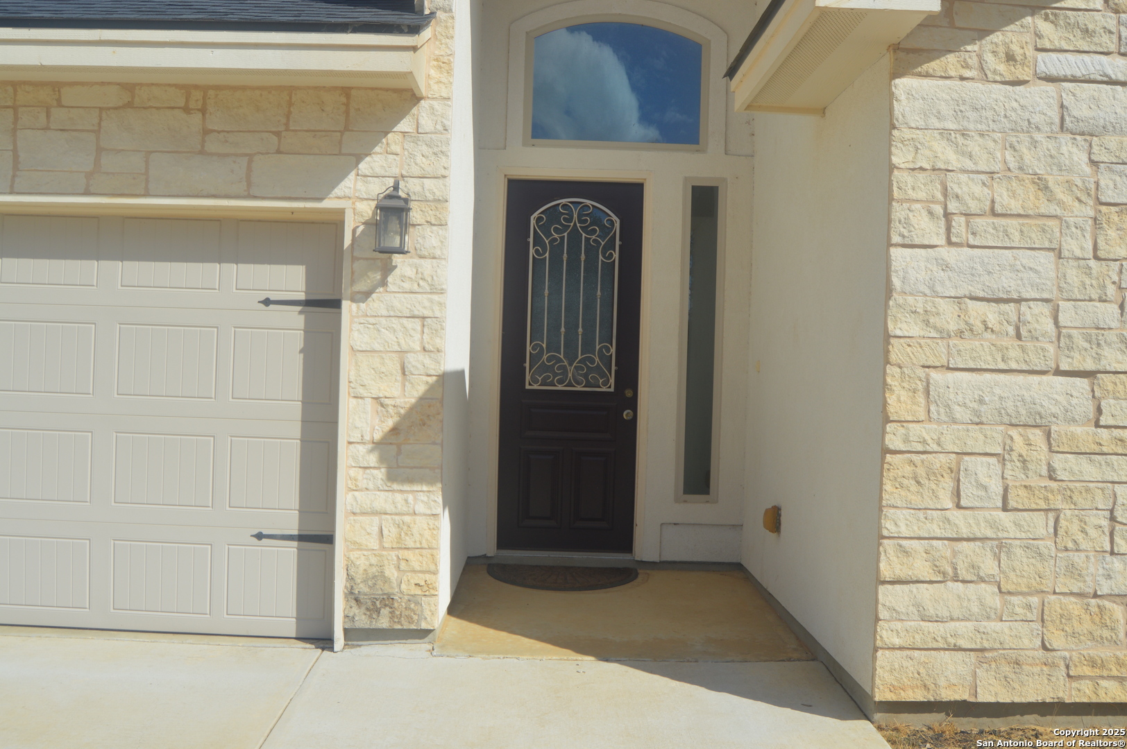 153 West Medium Meadow Drive Lytle, TX 78052 - Photo 4 of 26 a view of front door of a house