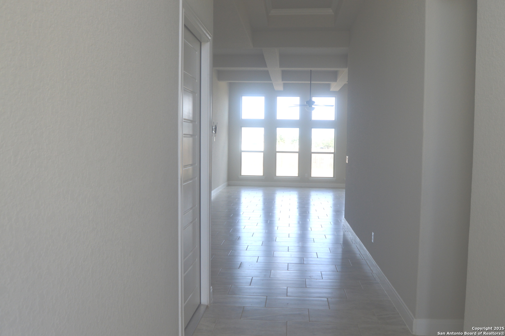 153 West Medium Meadow Drive Lytle, TX 78052 - Photo 5 of 26 a view of empty room with wooden floor and fan