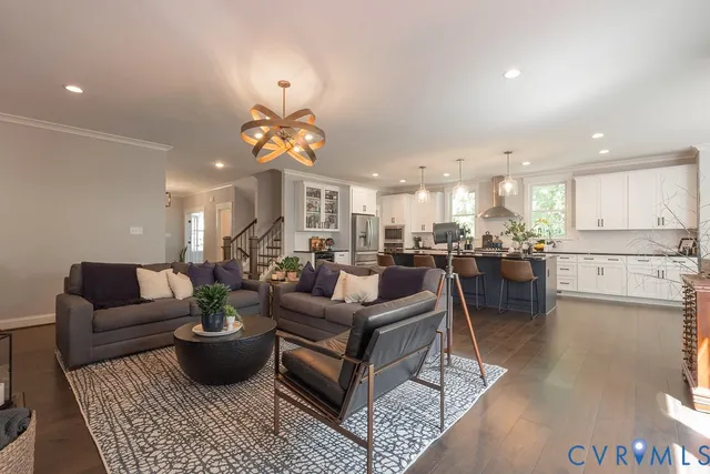 a dining room with wooden floor and a table