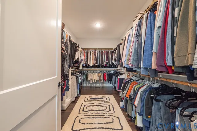 a bathroom with a toilet a sink and a mirror