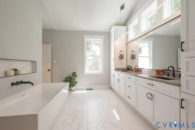 a utility room with washer and dryer