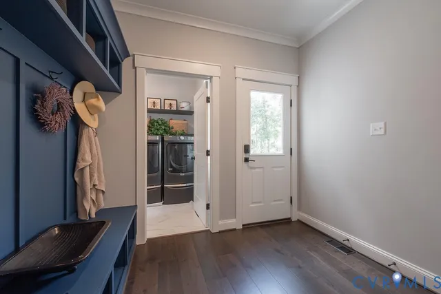 a view of entryway with wooden floor