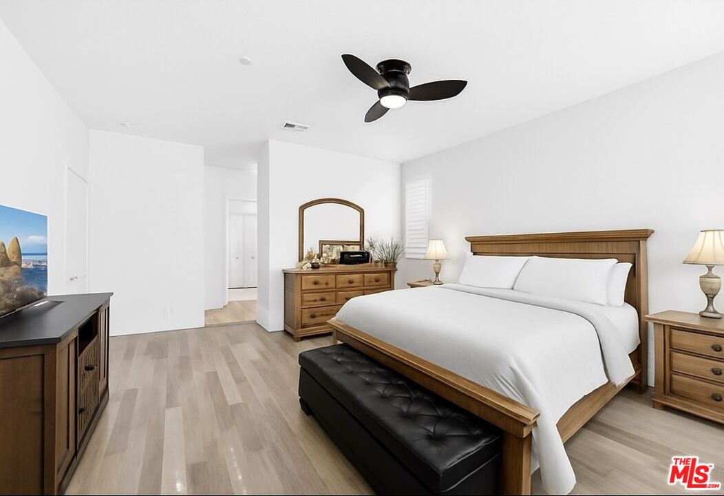 707 Colorado Circle Carson, CA 90745 - Photo 12 of 40 a bedroom with a bed and a dresser