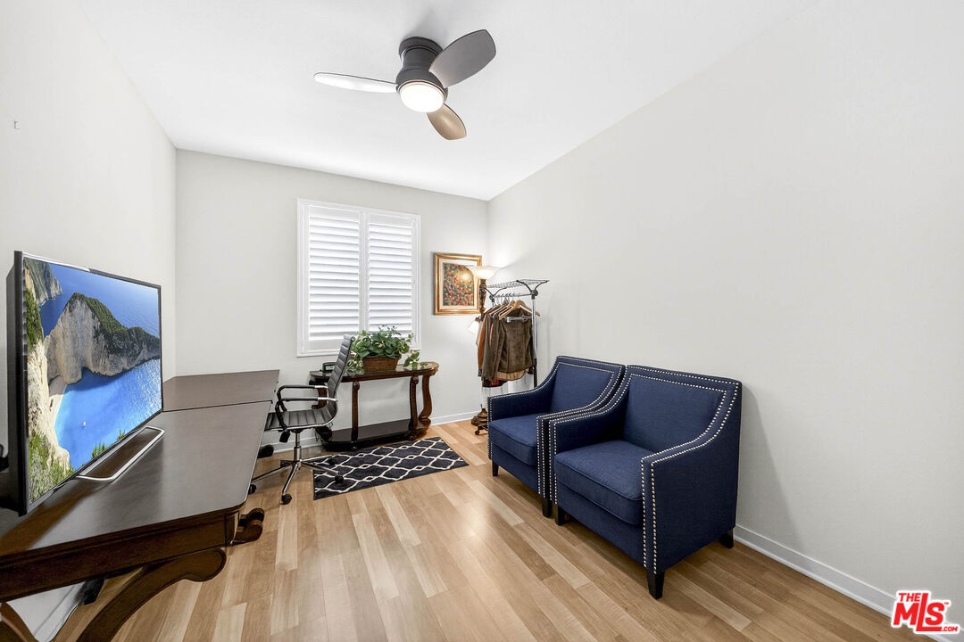707 Colorado Circle Carson, CA 90745 - Photo 17 of 40 a living room with furniture and a flat screen tv