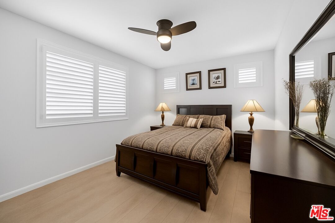 707 Colorado Circle Carson, CA 90745 - Photo 19 of 40 a bedroom with a bed and window