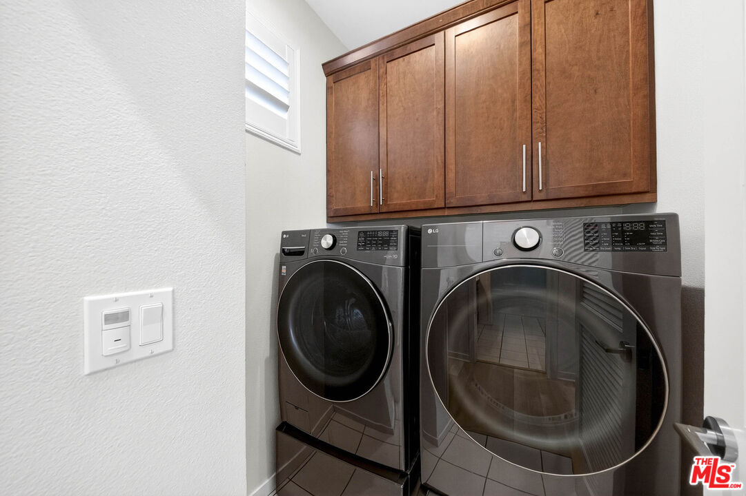 707 Colorado Circle Carson, CA 90745 - Photo 21 of 40 a utility room with dryer and washer
