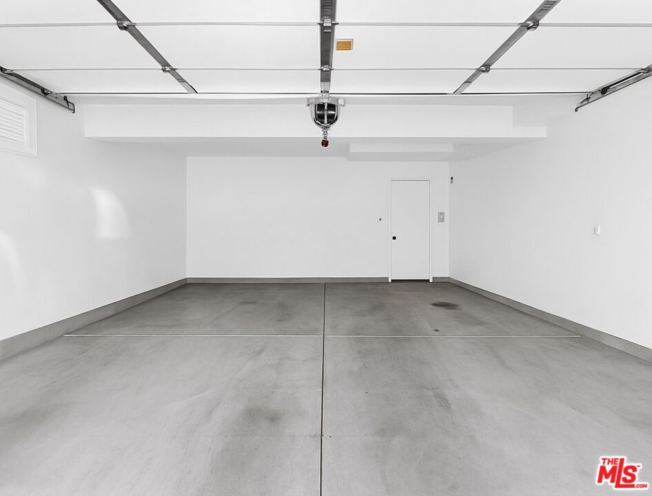 707 Colorado Circle Carson, CA 90745 - Photo 22 of 40 a view of a room with racks on the wall