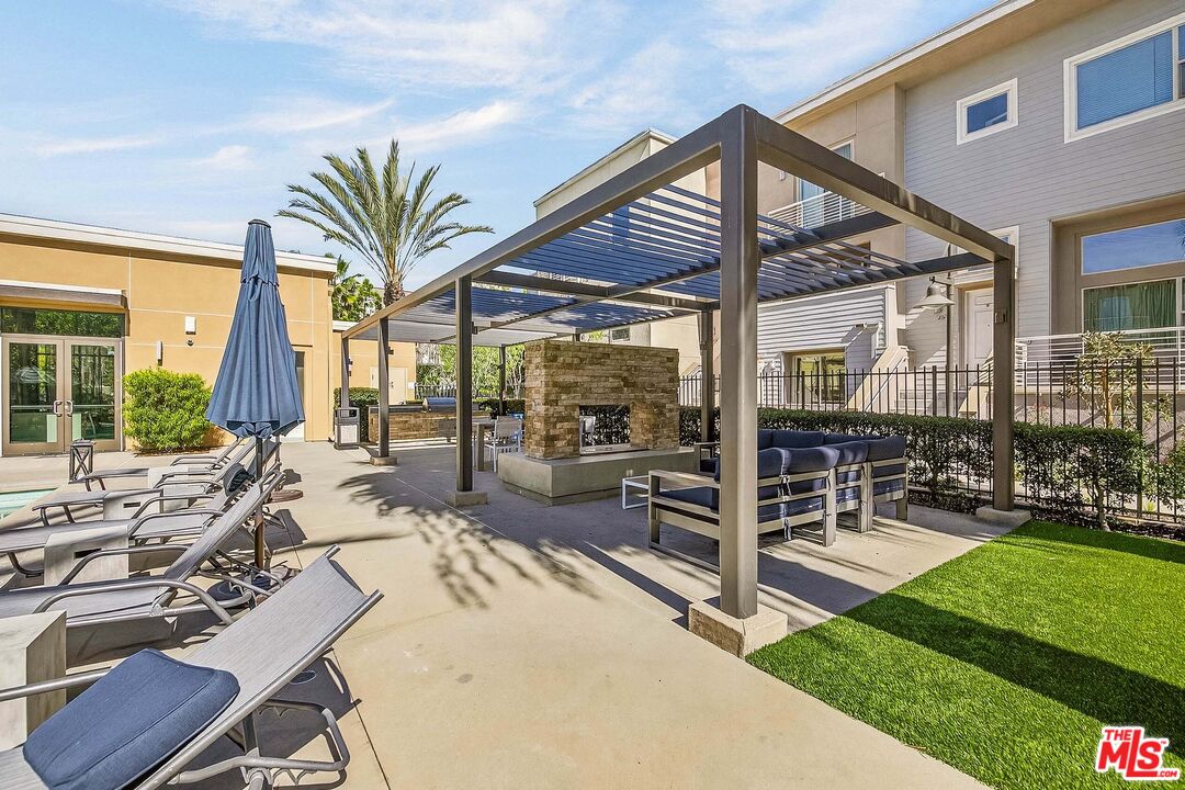 707 Colorado Circle Carson, CA 90745 - Photo 30 of 40 a view of outdoor space yard deck patio and swimming pool