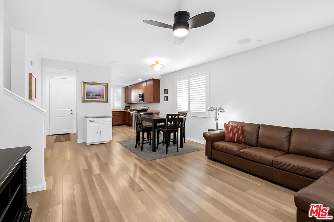 707 Colorado Circle Carson, CA 90745 - Photo 3 of 40 a living room with furniture and a wooden floor