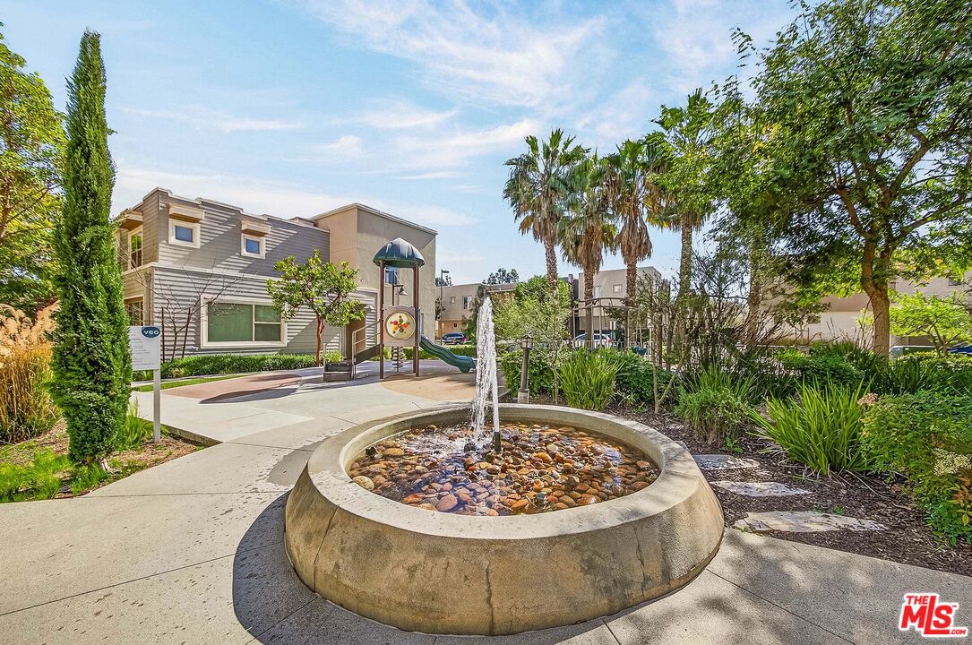 707 Colorado Circle Carson, CA 90745 - Photo 31 of 40 a view of a fountain in the backyard of house
