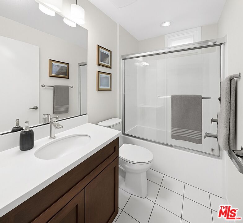 707 Colorado Circle Carson, CA 90745 - Photo 9 of 40 a bathroom with a sink a toilet and shower