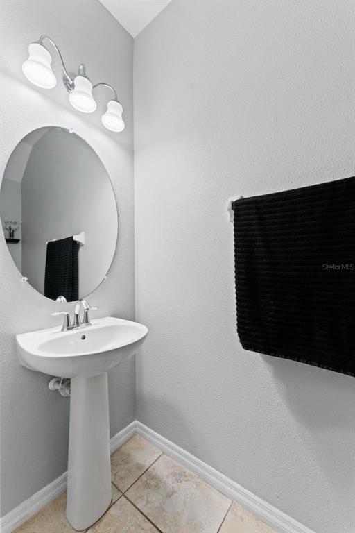 9641 Trumpet Vine Loop Trinity, FL 34655 - Photo 22 of 45 1 st floor guest bathroom
