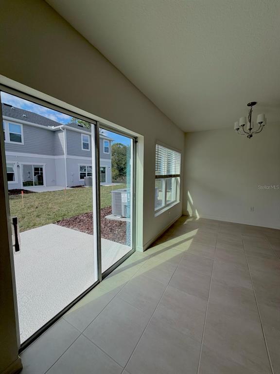 2787 Raindrop Run Street Clermont, FL 34714 - Photo 5 of 18 a view of porch with seating space