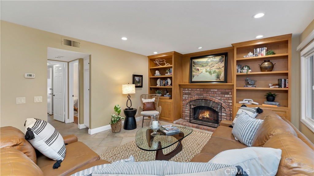 2 Rainstar Irvine, CA 92614 - Photo 17 of 49 a living room with furniture fireplace and window
