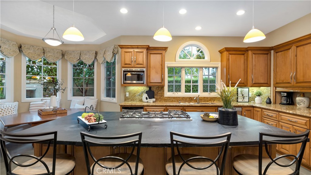 2 Rainstar Irvine, CA 92614 - Photo 22 of 49 a view of a dining room with furniture window and outside view