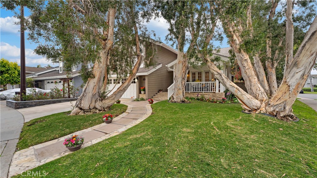 2 Rainstar Irvine, CA 92614 - Photo 3 of 49 a view of a house with a yard