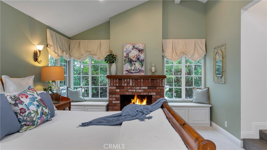 2 Rainstar Irvine, CA 92614 - Photo 36 of 49 a bedroom with furniture and a fireplace