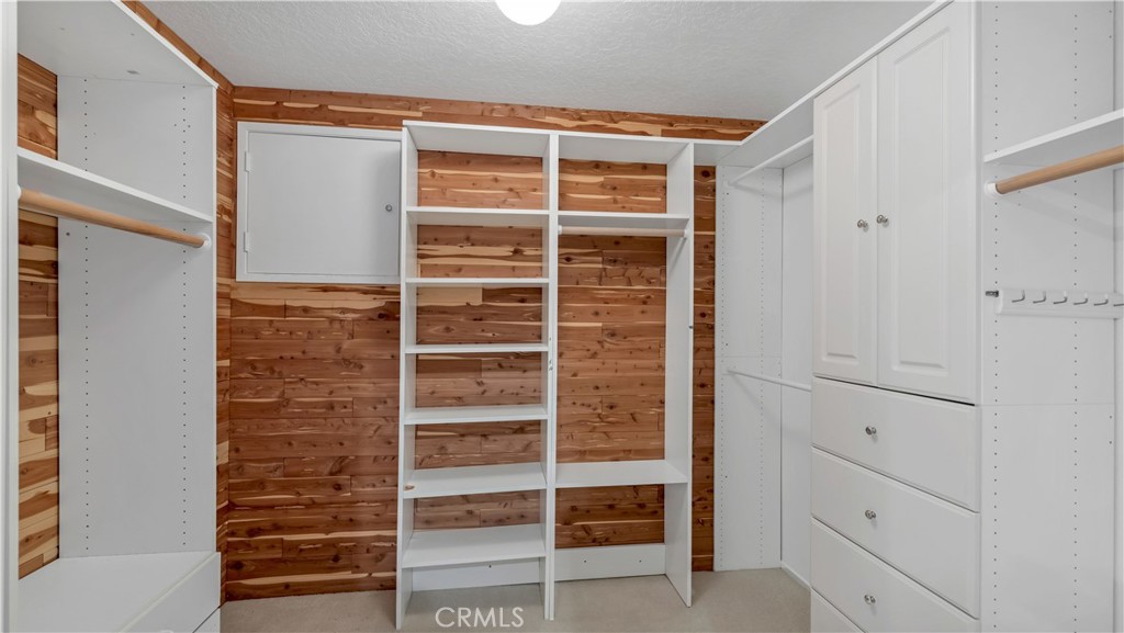2 Rainstar Irvine, CA 92614 - Photo 38 of 49 a view of walk in closet with empty racks