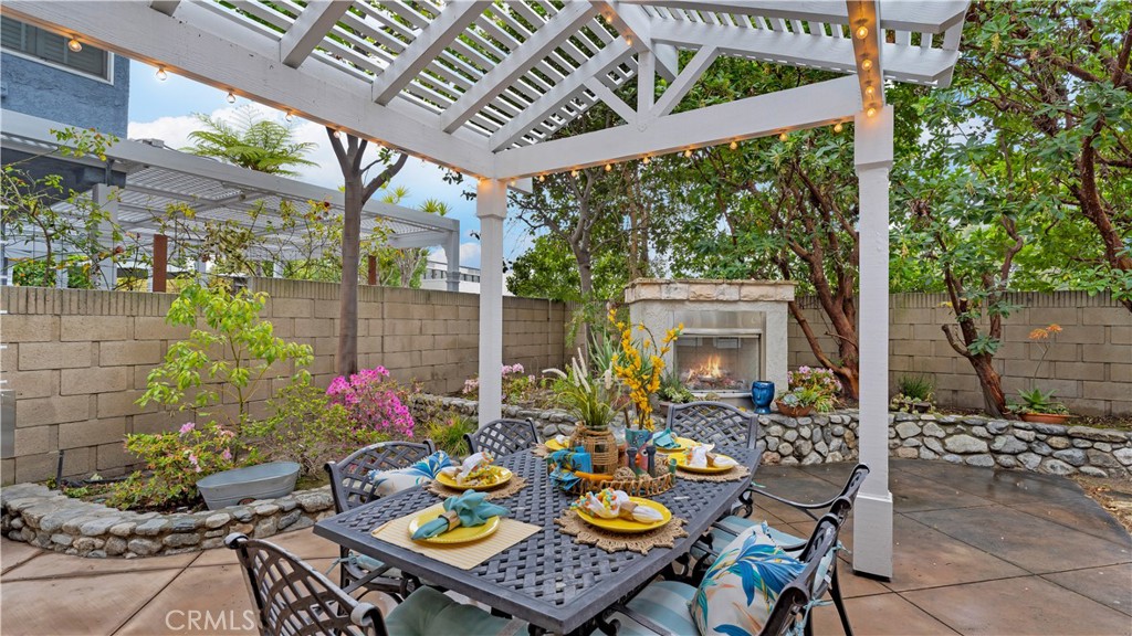 2 Rainstar Irvine, CA 92614 - Photo 44 of 49 a view of an outdoor dining space with a table and chairs