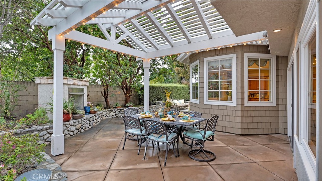 2 Rainstar Irvine, CA 92614 - Photo 45 of 49 a view of a patio with table and chairs and potted plants