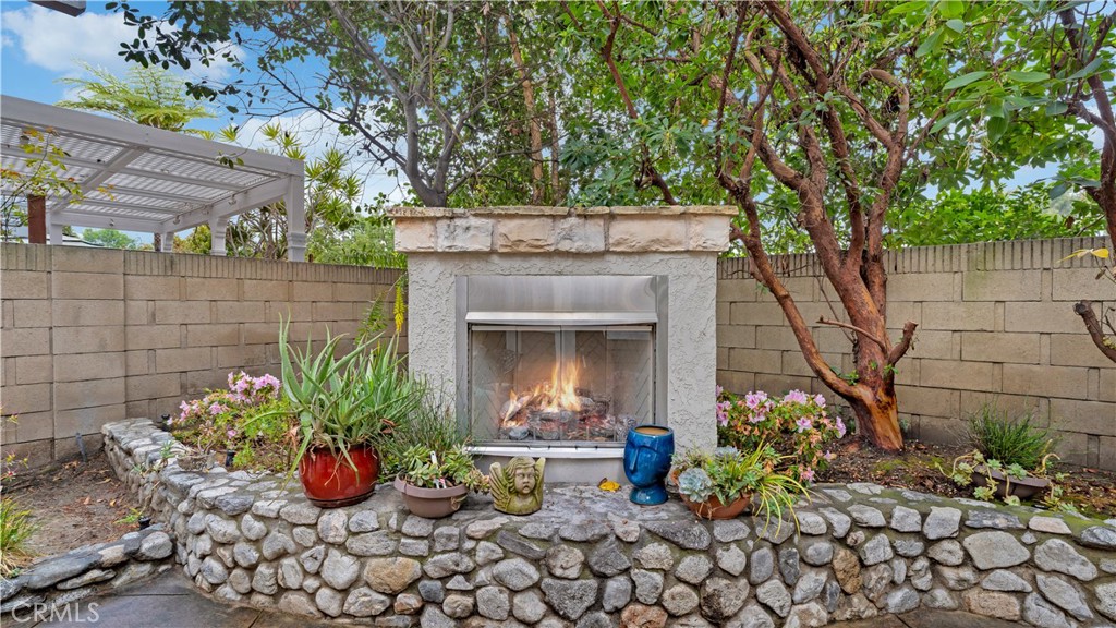 2 Rainstar Irvine, CA 92614 - Photo 46 of 49 a view of a patio with table and chairs and potted plants