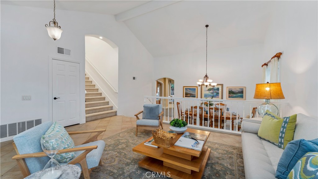 2 Rainstar Irvine, CA 92614 - Photo 10 of 49 a living room with furniture and a chandelier