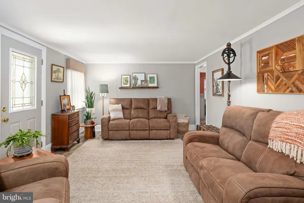 a living room with furniture and a couch
