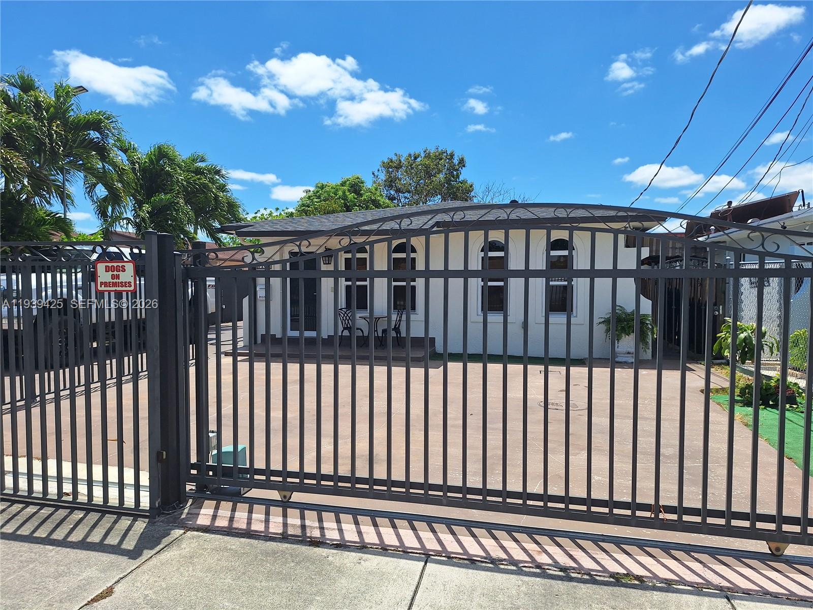 7168 Southwest 21st Street Miami, FL 33155 - Photo 9 of 9 a view of a porch with a backyard