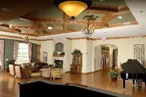 a view of a living room and chandelier
