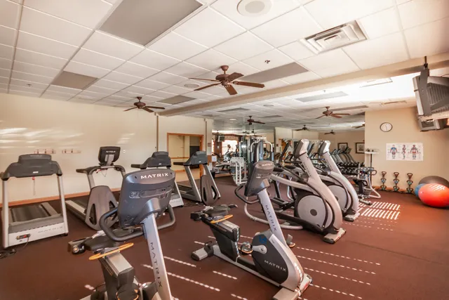 a view of a room with gym equipment