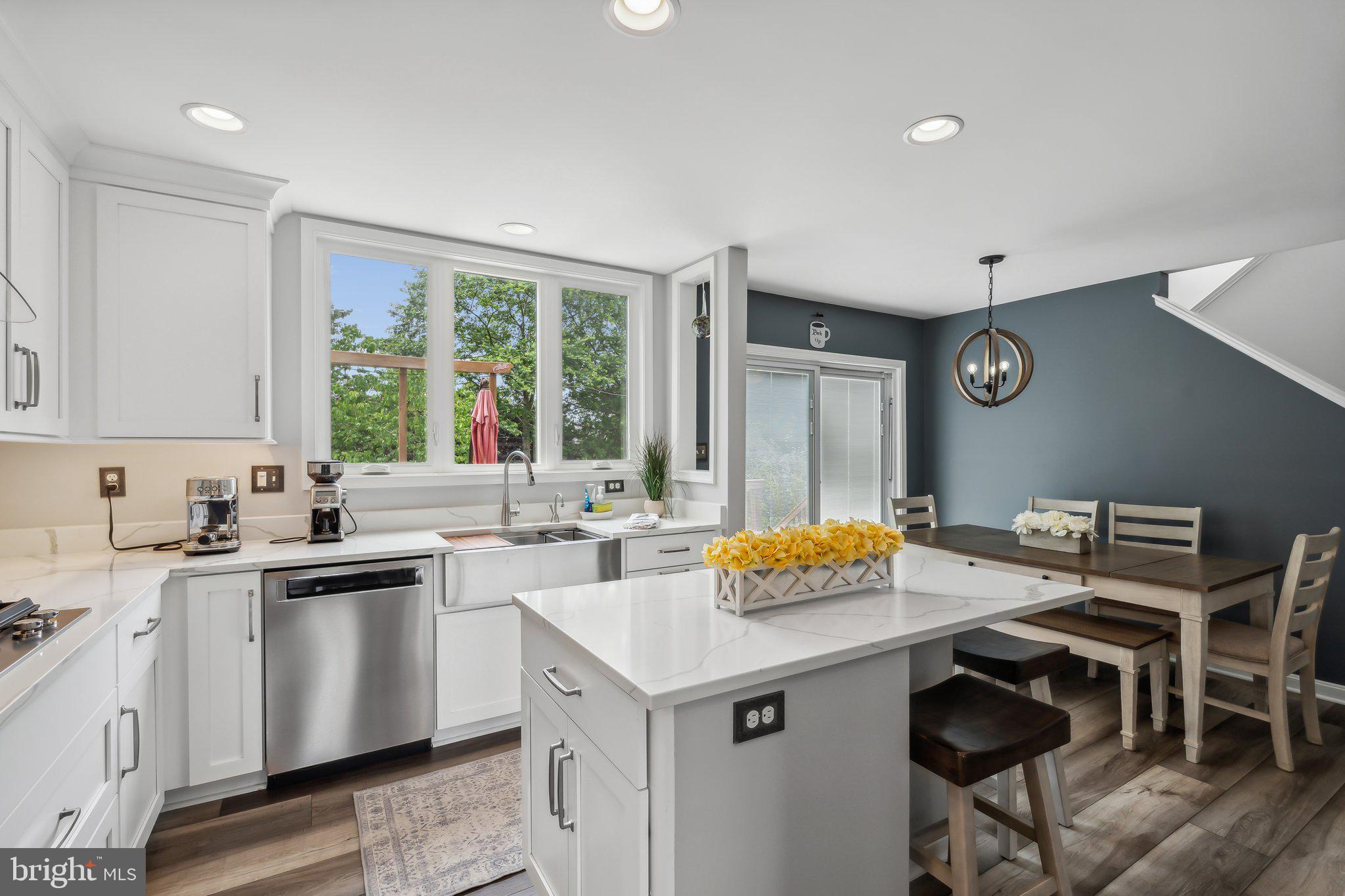 20575 Coppersmith Drive Ashburn, VA 20147 - Photo 11 of 51 Custom windows overlooking deck and yard