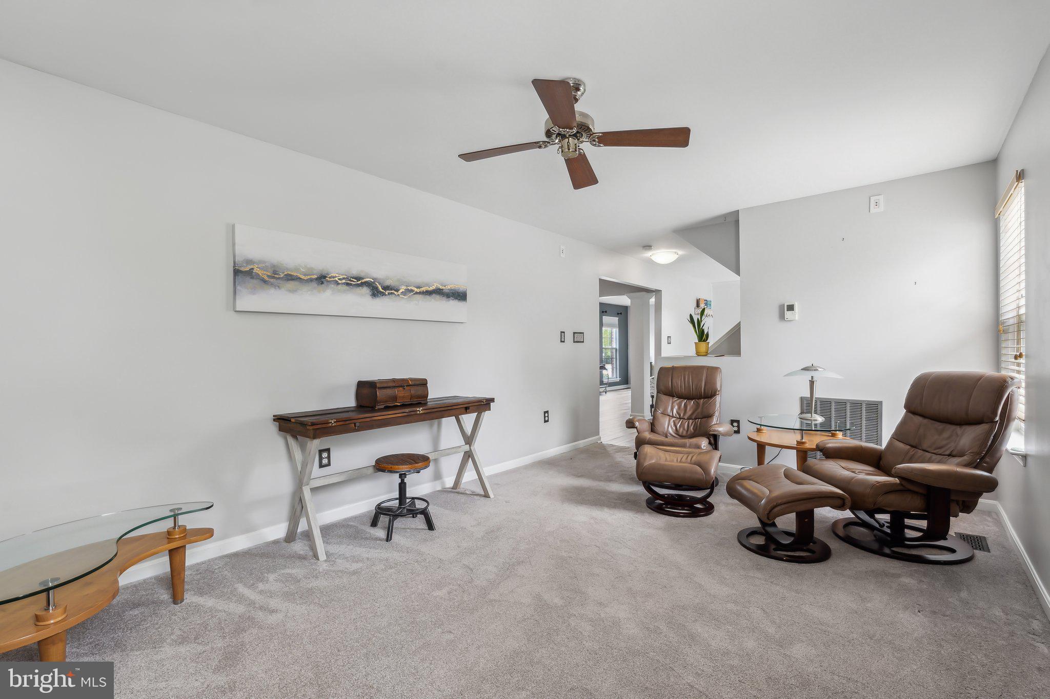20575 Coppersmith Drive Ashburn, VA 20147 - Photo 8 of 51 Main level family room