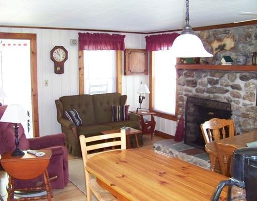 28 Pickering Street Sebago, ME 04029 - Photo 18 of 22 Living Room. rental cottage living room