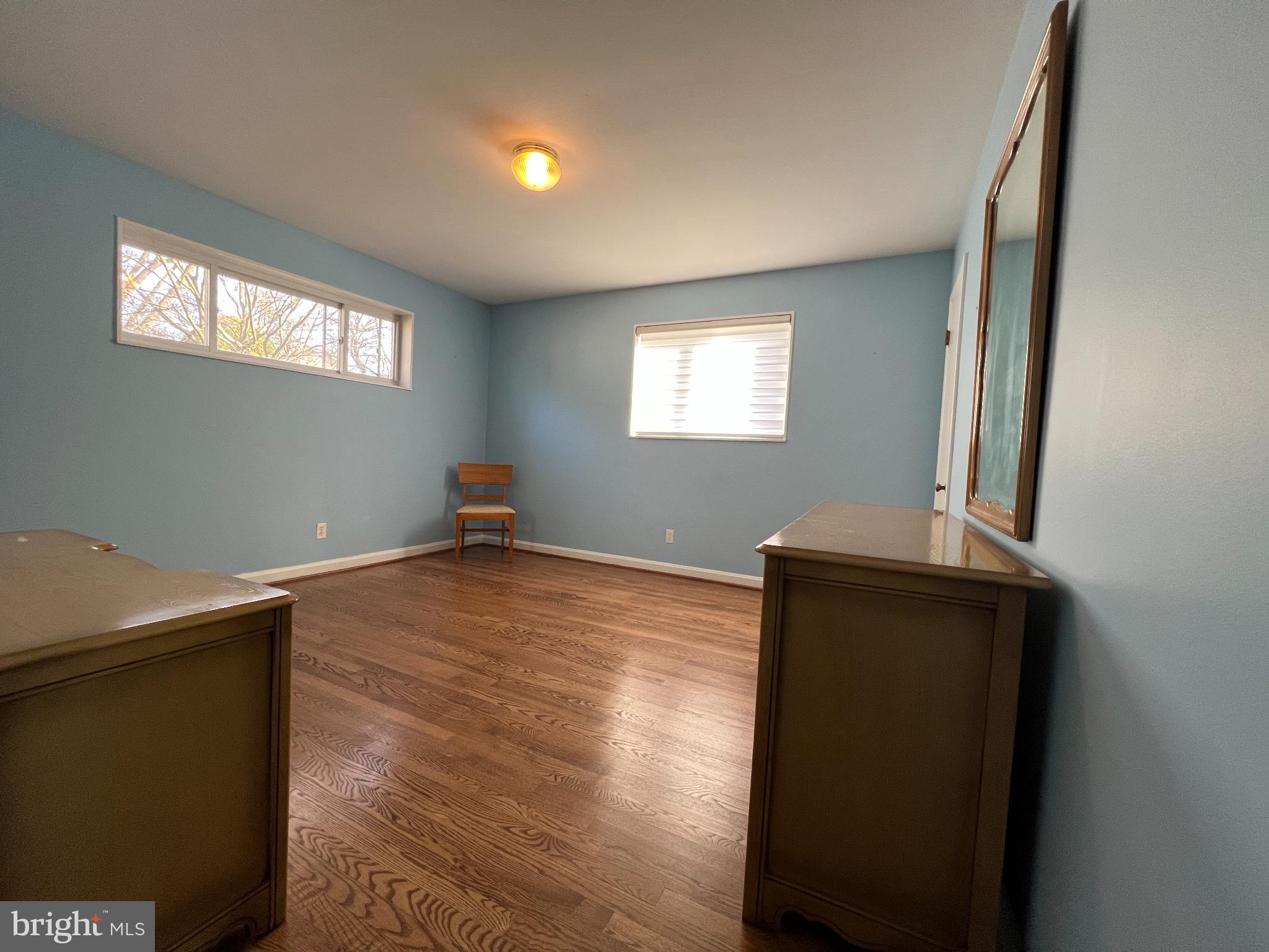 6205 Kirby Road Bethesda, MD 20817 - Photo 12 of 42 Bright and airy room with serene blue walls.