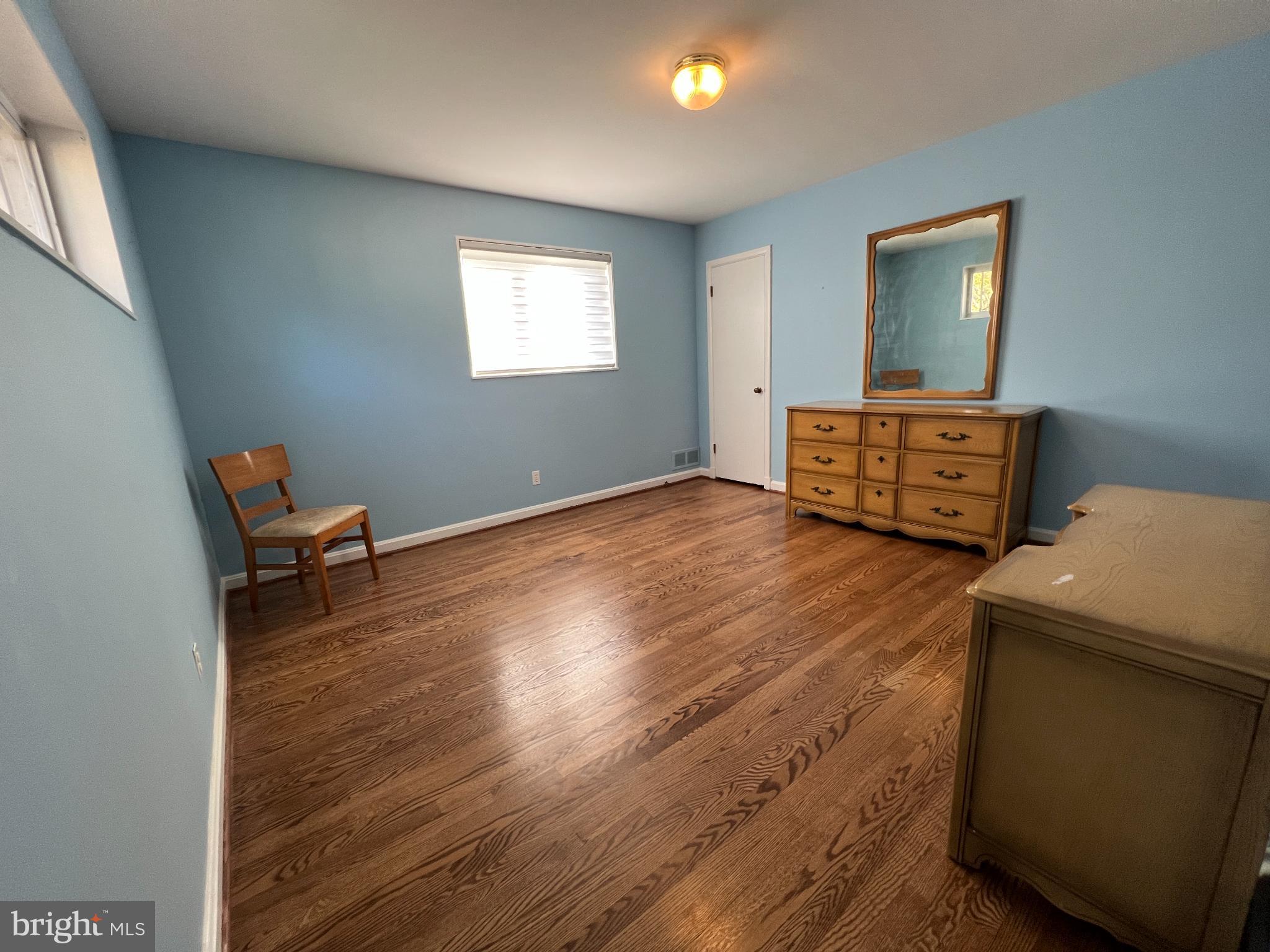 6205 Kirby Road Bethesda, MD 20817 - Photo 14 of 42 Bright and airy room with serene blue walls.