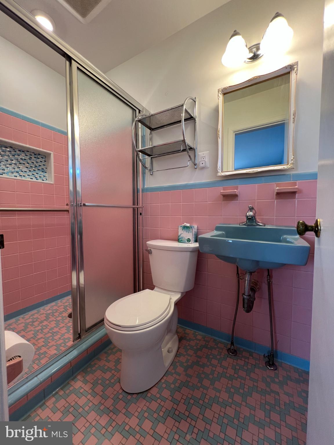6205 Kirby Road Bethesda, MD 20817 - Photo 15 of 42 Charming retro bathroom with pastel hues.