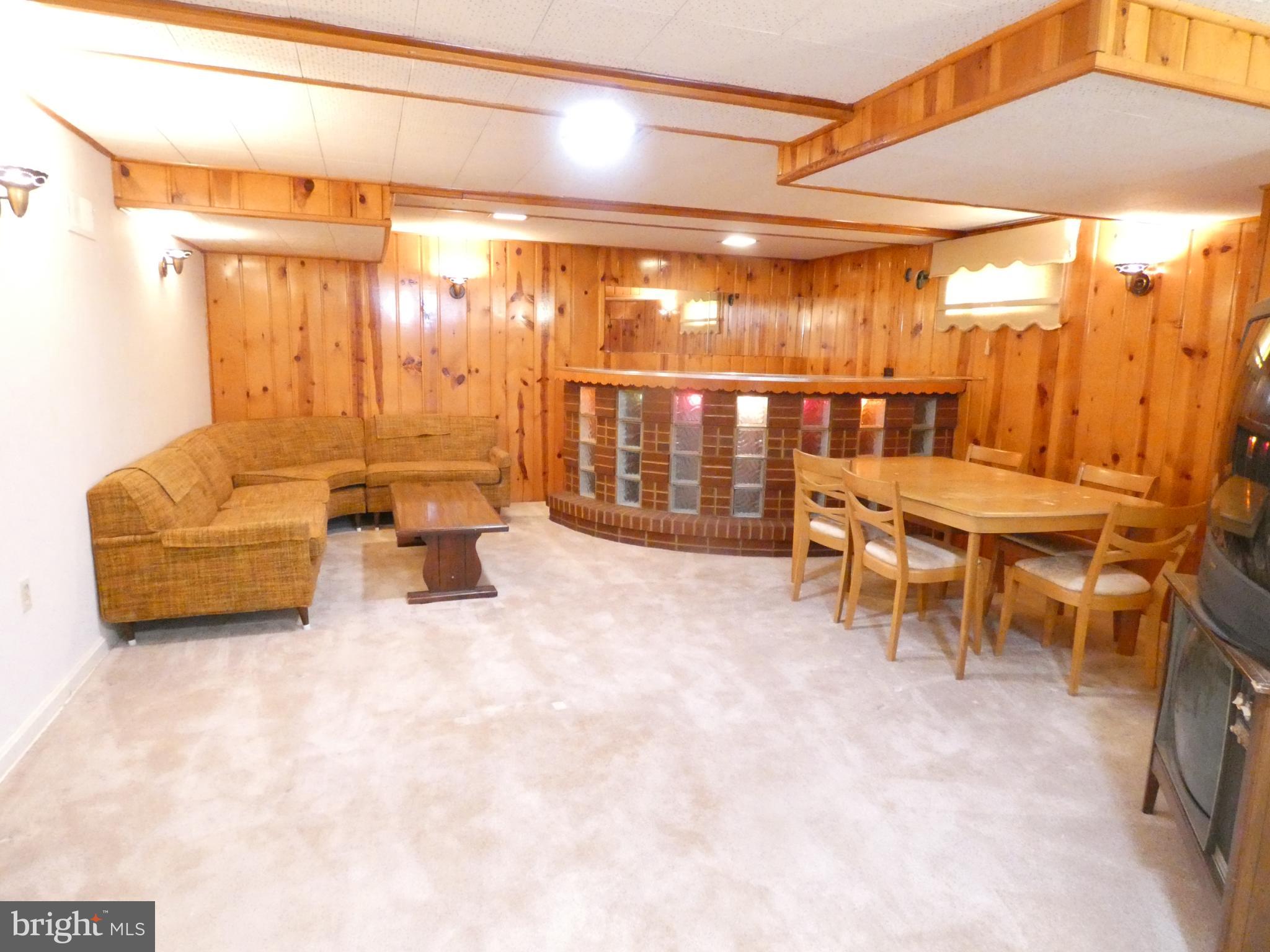 6205 Kirby Road Bethesda, MD 20817 - Photo 22 of 42 Cozy basement retreat with warm wood accents.