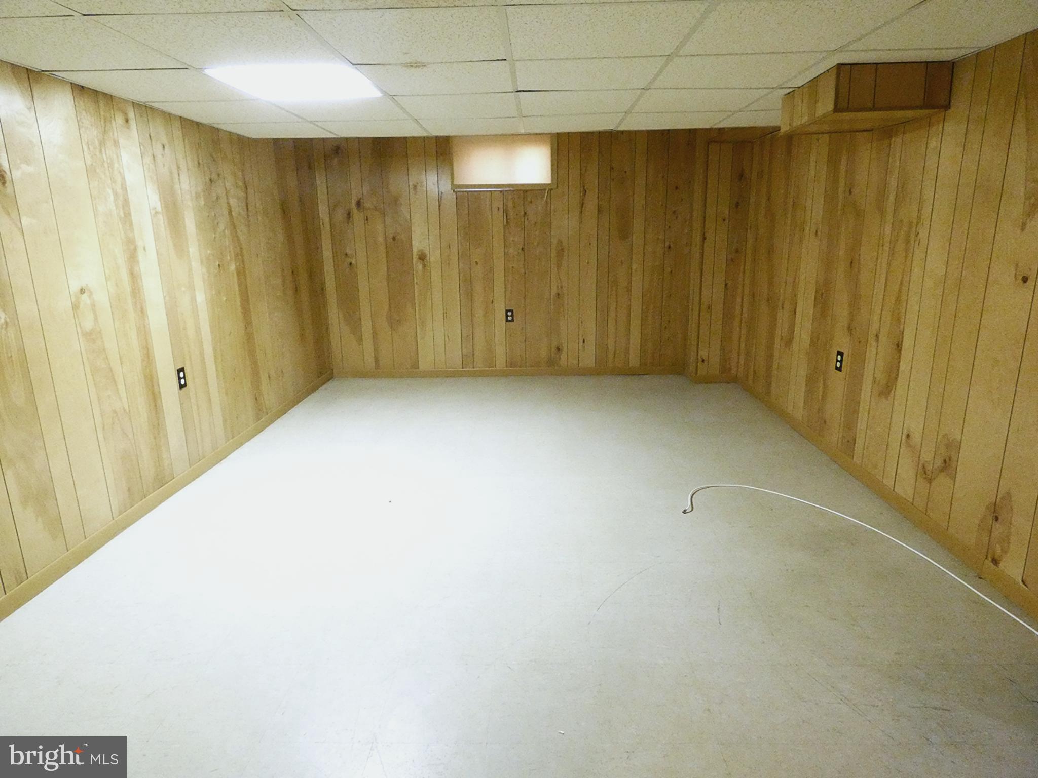 6205 Kirby Road Bethesda, MD 20817 - Photo 26 of 42 Spacious basement with warm wood accents.