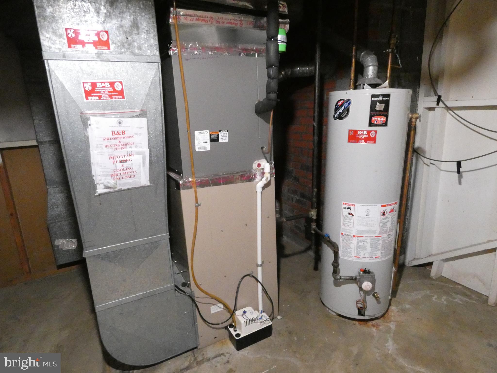 6205 Kirby Road Bethesda, MD 20817 - Photo 32 of 42 Utility area with heating and water systems.