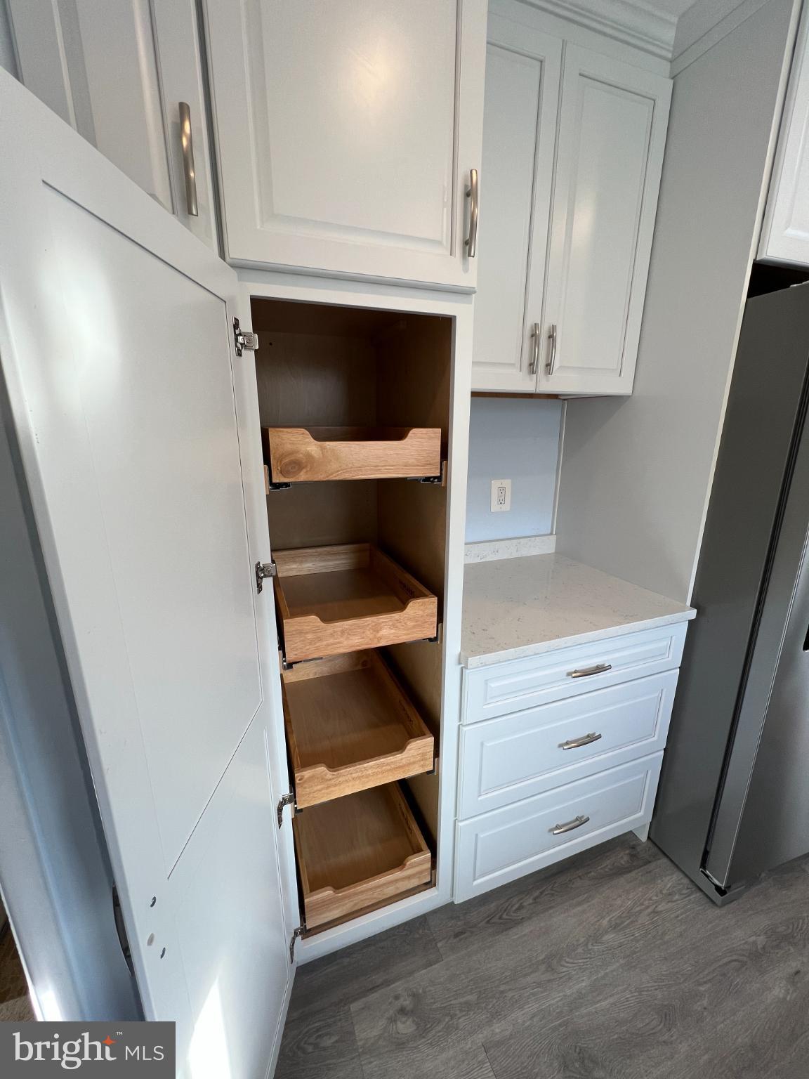 6205 Kirby Road Bethesda, MD 20817 - Photo 33 of 42 Sleek cabinetry with spacious pull-out shelves.