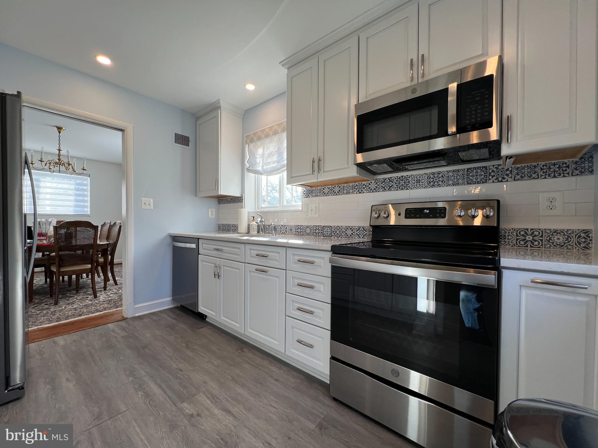 6205 Kirby Road Bethesda, MD 20817 - Photo 10 of 42 Modern kitchen with sleek finishes.