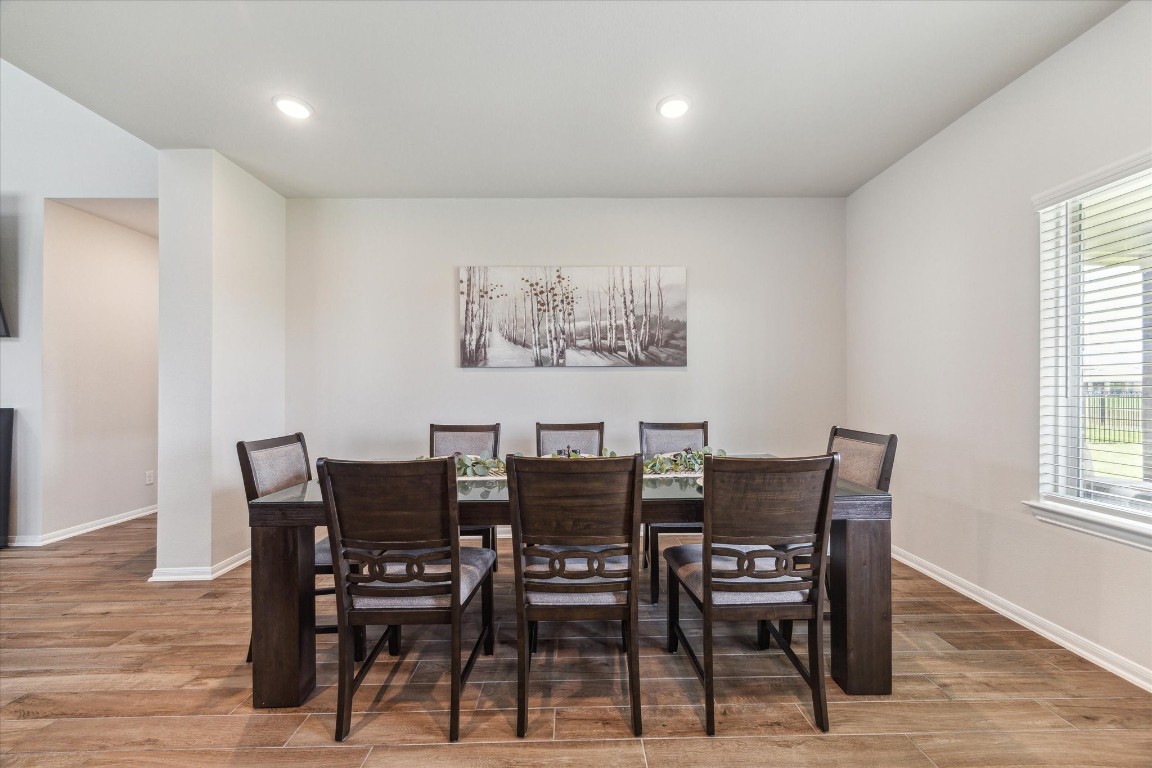 1523 Alpine Drive Rosharon, TX 77583 - Photo 4 of 25 a view of a dining room with furniture and wooden floor